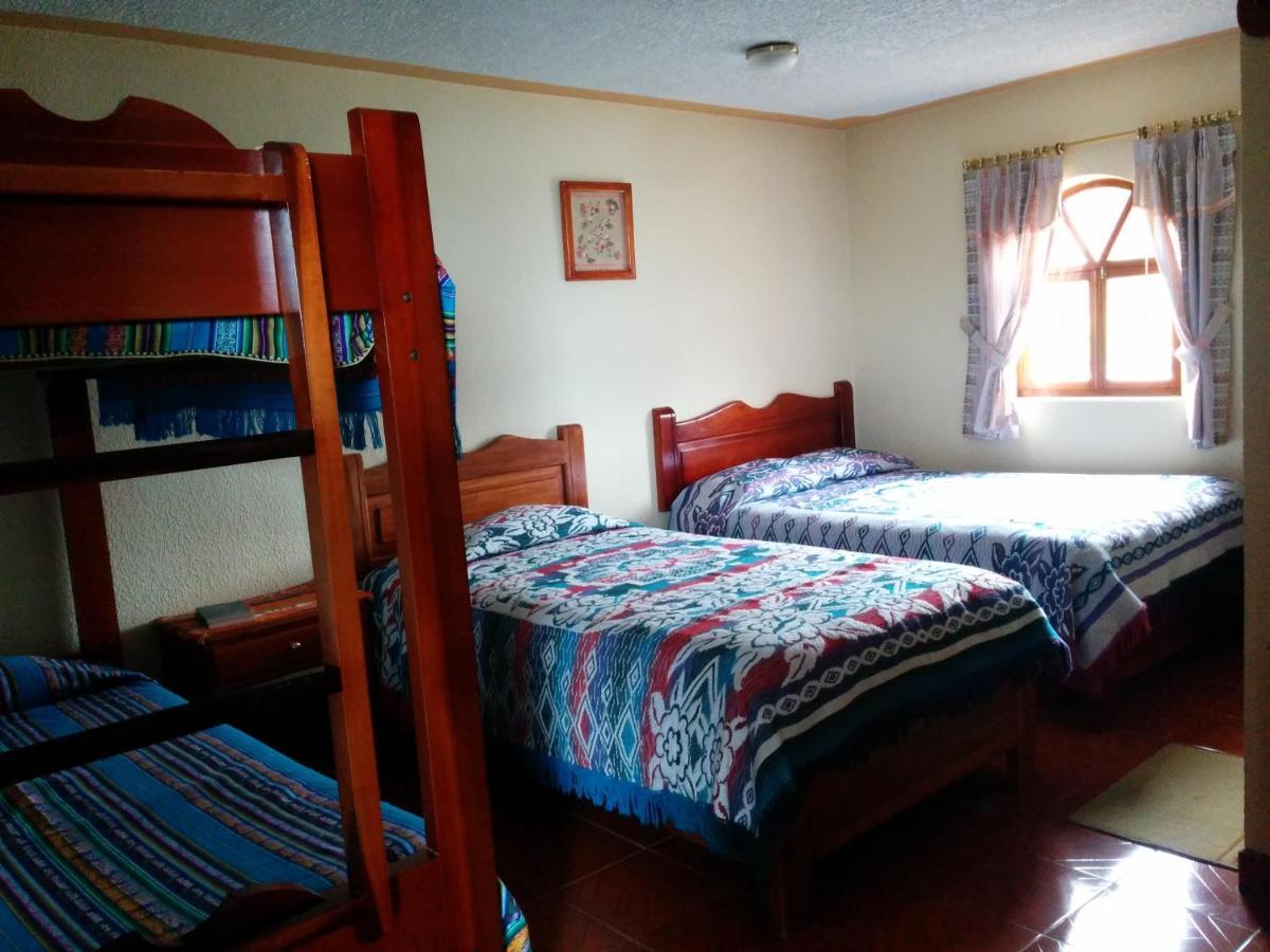 Hostal Curinan Отавало Экстерьер фото